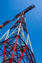 High-voltage electricity pylon and power lines against blue sky Royalty Free Stock Photo