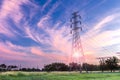 High voltage electricity pylon on sunrise background Royalty Free Stock Photo