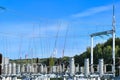 High voltage electricity pylons against perfect blue sky with white clouds. electric poles Royalty Free Stock Photo