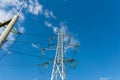 High voltage electricity pylons against perfect  blue sky Royalty Free Stock Photo