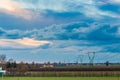 Power line in cultivated fields Royalty Free Stock Photo