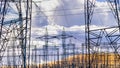 High voltage electricity towers and power lines at a substation in Central California; a substation is a part of an electrical Royalty Free Stock Photo