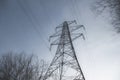 A high voltage electricity transmission pylon in winter in the UK Royalty Free Stock Photo