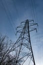 A high voltage electricity transmission pylon in winter in the UK Royalty Free Stock Photo