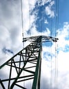 High voltage eletrical towers and lines with blue sky and clouds. Eletricity towers with blue sky background. Royalty Free Stock Photo