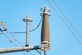 High voltage insulators on overhead electric power line Royalty Free Stock Photo