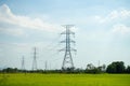 High voltage pole on blue sky background. Royalty Free Stock Photo