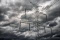 High voltage pole and dark clouds on sky Royalty Free Stock Photo