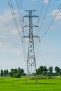 High voltage pole in paddy field Royalty Free Stock Photo