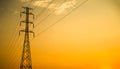 High Voltage Pole on Sunset Background Line Electric Energy Power Station Tower Hight Voltage Transmission electrician Grid,Danger Royalty Free Stock Photo