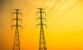 High voltage pole on Sunset Background Line Power Utility Tower Electric Voltage Transmission Energy Station Distribution, Royalty Free Stock Photo