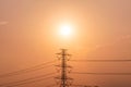 High voltage pole, Transmission tower with power line at sunset Royalty Free Stock Photo