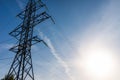 High-voltage pole wires power lines at sunset electricity distribution station.high voltage electric transmission tower Royalty Free Stock Photo