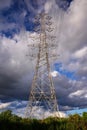 high voltage post against blue sky Royalty Free Stock Photo