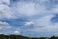 High voltage post.High-voltage tower sky background.Electric pole and electric cable on the field in the countryside Royalty Free Stock Photo