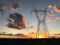 High voltage post.High-voltage tower sky background. Royalty Free Stock Photo