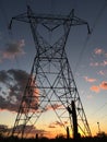 High voltage post.High-voltage tower sky background. Royalty Free Stock Photo