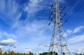 High voltage post.High-voltage tower on blue sky Royalty Free Stock Photo