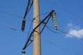 High voltage post. High-voltage tower sky background.