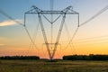 high voltage post,High voltage tower sky sunset background. Royalty Free Stock Photo
