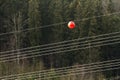 High voltage power line with big ball for warning pilots, low fl Royalty Free Stock Photo
