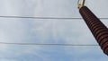 High Voltage Power Line and Electrical Insulator Against Sky Royalty Free Stock Photo