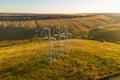 High voltage power line on industrial electricity line tower for electrification infrastructure rural countryside