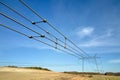 High voltage power line with insulation divider of electric power wires for safe delivering of electrical energy through