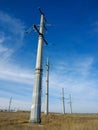 High voltage power line pylons in a clearing Royalty Free Stock Photo