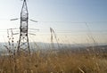 High voltage power line tower in the mountain Royalty Free Stock Photo