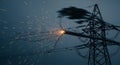 Arcing Electrical Sparks on a High Voltage Power Line Tower at Night Generating Intense Light Electricity Transmission Royalty Free Stock Photo