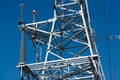 High voltage power line tower sky closeup Royalty Free Stock Photo