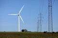 High voltage power line and a wind turbine Royalty Free Stock Photo