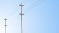 High voltage power lines electricity poles Royalty Free Stock Photo