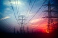High Voltage Power Lines - Electricity Transmission Lines at Sunset Royalty Free Stock Photo