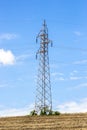 High-voltage power lines in the field Royalty Free Stock Photo