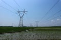 high-voltage power lines intersect with steel towers