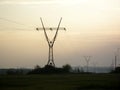 High voltage power lines at sunset