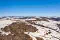 High voltage power lines in the mountains in winter aerial view Royalty Free Stock Photo