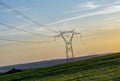 high voltage power lines at sunset Royalty Free Stock Photo