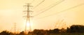 high-voltage power lines at sunset,high voltage electric transmission tower.Electricity distribution station Royalty Free Stock Photo