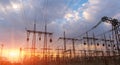 High-voltage power lines at sunset or sunrise. High voltage electric transmission tower