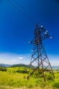 High voltage power lines tower in mountains Royalty Free Stock Photo