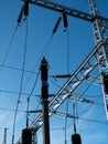 high-voltage power lines of transformer substation against the blue sky Royalty Free Stock Photo