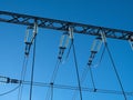 high-voltage power lines of transformer substation against the blue sky Royalty Free Stock Photo