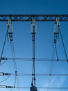 high-voltage power lines of transformer substation against the blue sky Royalty Free Stock Photo