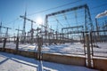 High voltage power lines in the winter. Thermal power plant. High-voltage transformer substation. Royalty Free Stock Photo