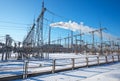 High voltage power lines in the winter. Thermal power plant. Royalty Free Stock Photo