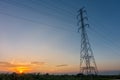 High voltage power pylons in the field Royalty Free Stock Photo