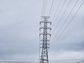 High Voltage Power Tower, Transmission Line, Blue Sky Background. Royalty Free Stock Photo